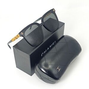 CHANEL Black and Gold Sunglasses
